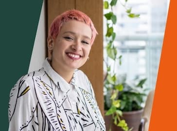 Woman with short hair smiling warmly